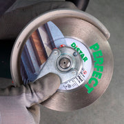 Tile installer using Perfect diamond blade on porcelain tile with clean edge
