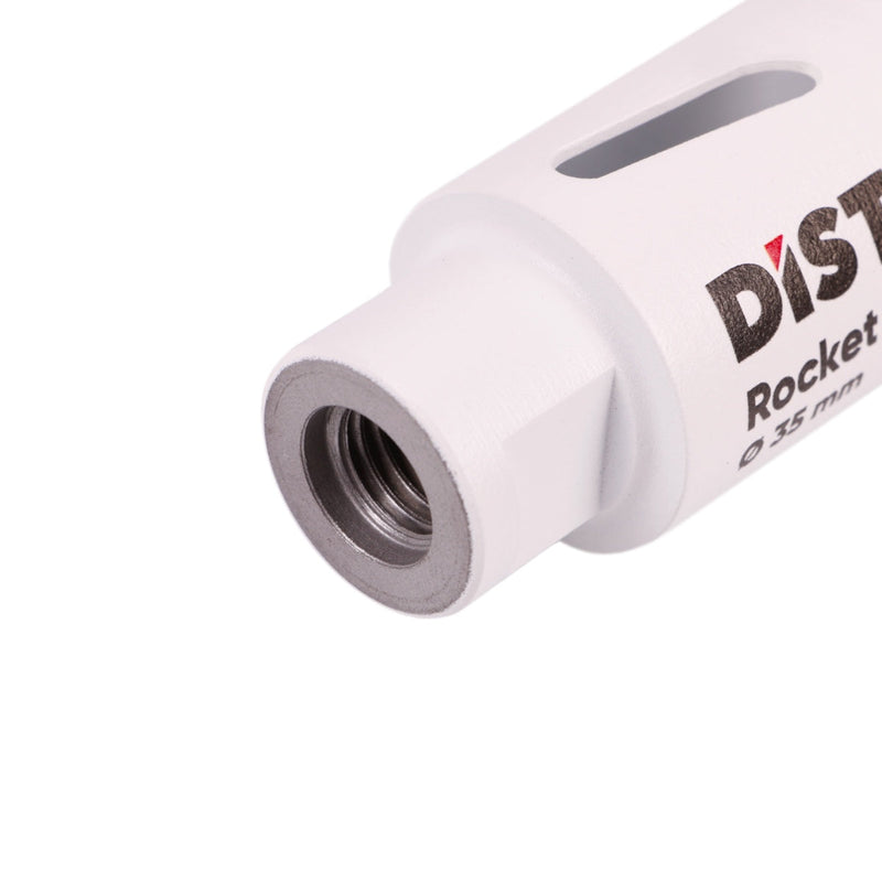 Close-up of a white cylindrical object with a threaded end, featuring the brand 'DISTINCTIVE'.