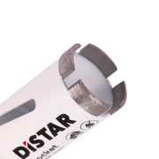 Close-up of a diamond drill bit with a white sleeve labeled 'DISTAR'.
