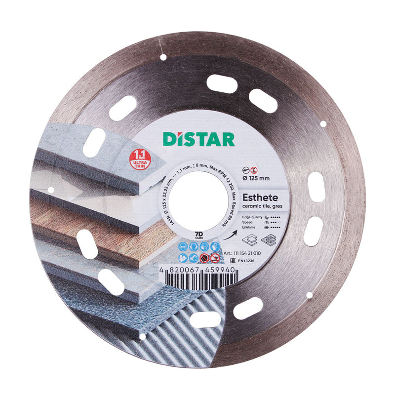 Diamond cutting blade with the brand name DISTAR, designed for cutting ceramic materials. The blade has a silver color, with a combination of solid and transparent areas, and features the text 'ESTHETE' on the label.