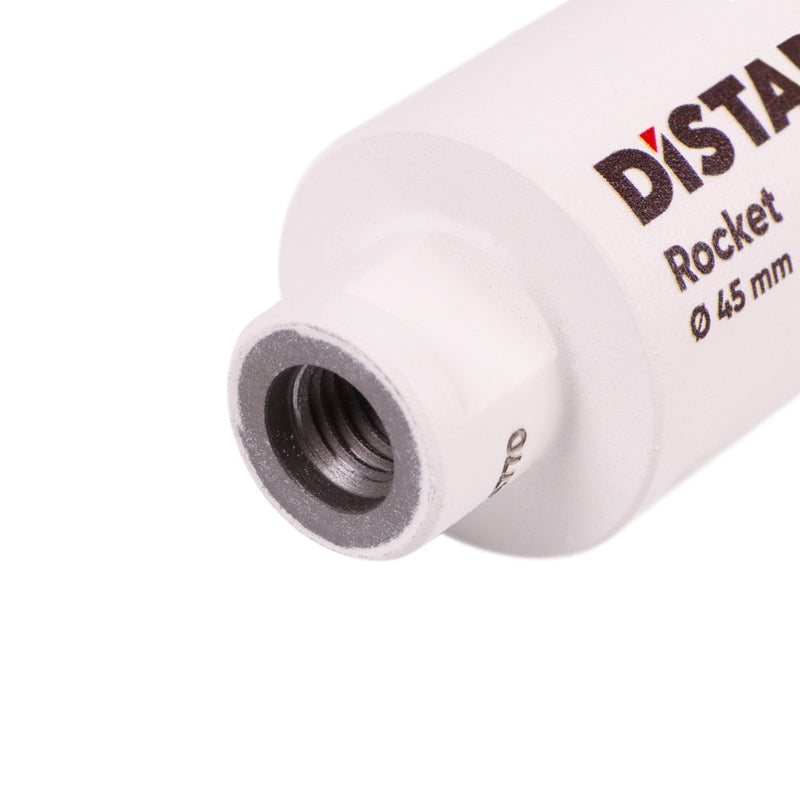 Close-up of a white cylindrical object with 'DISTAR' branding on a white background
