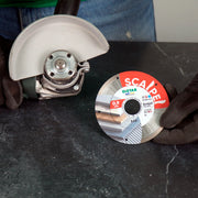 Installer using Scalpel blade for precision cut on porcelain gres tile