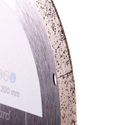 Close-up of a circular saw blade with visible teeth and specifications on a white background