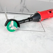 Small diamond blade making a precision cut in ceramic tile