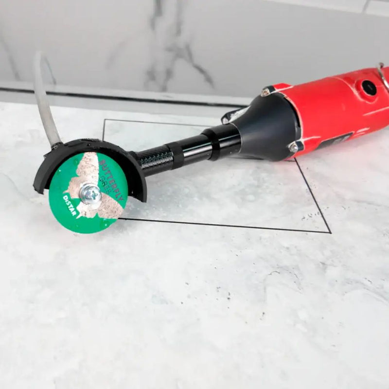 Small diamond blade making a precision cut in ceramic tile
