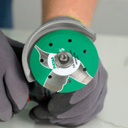 Installer using Colibri 3 inch diamond blade on cordless grinder for detailed porcelain cut
