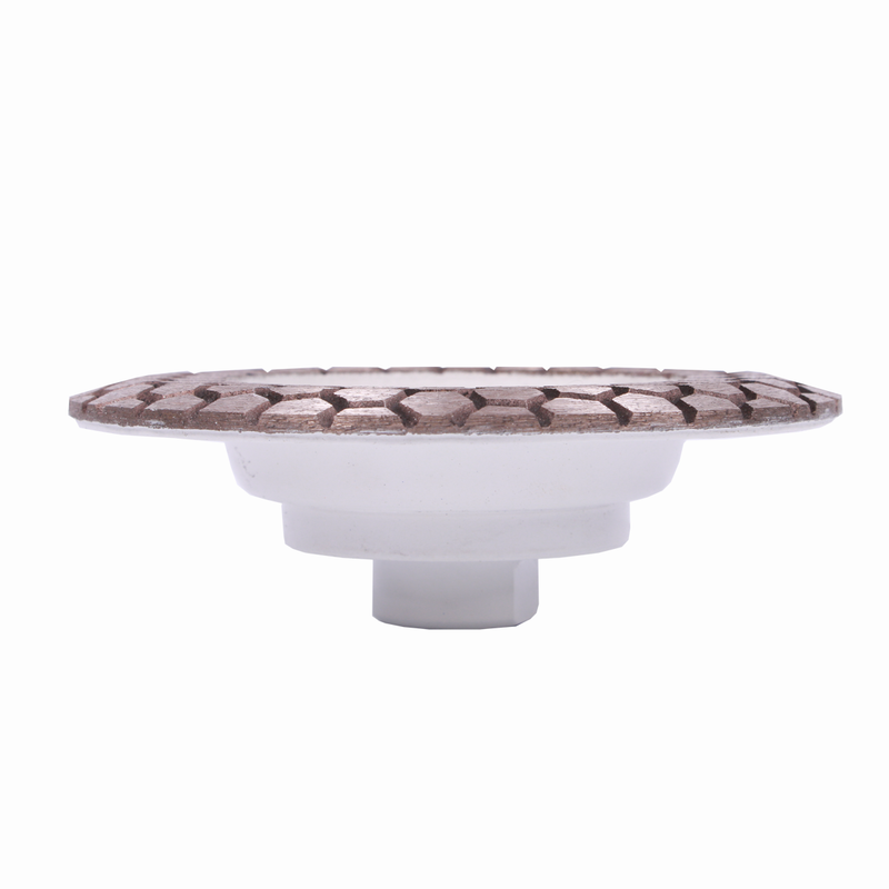 Round white dish with a decorative brown rim on a white background