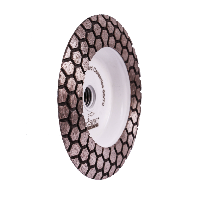 Diamond grinding wheel with honeycomb pattern on a white background
