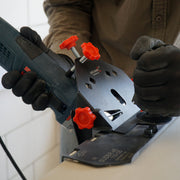 Tile installer using SLIDER 2.0 Cutting Guard on porcelain tile
