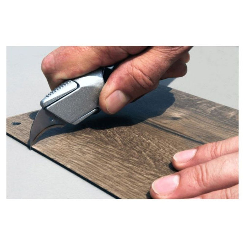 Better Tools 20304 German Concave Hook Blades being used to cut LVT