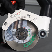 Professional tiler using ROLLER Cutting Guard for dust-free tile cutting