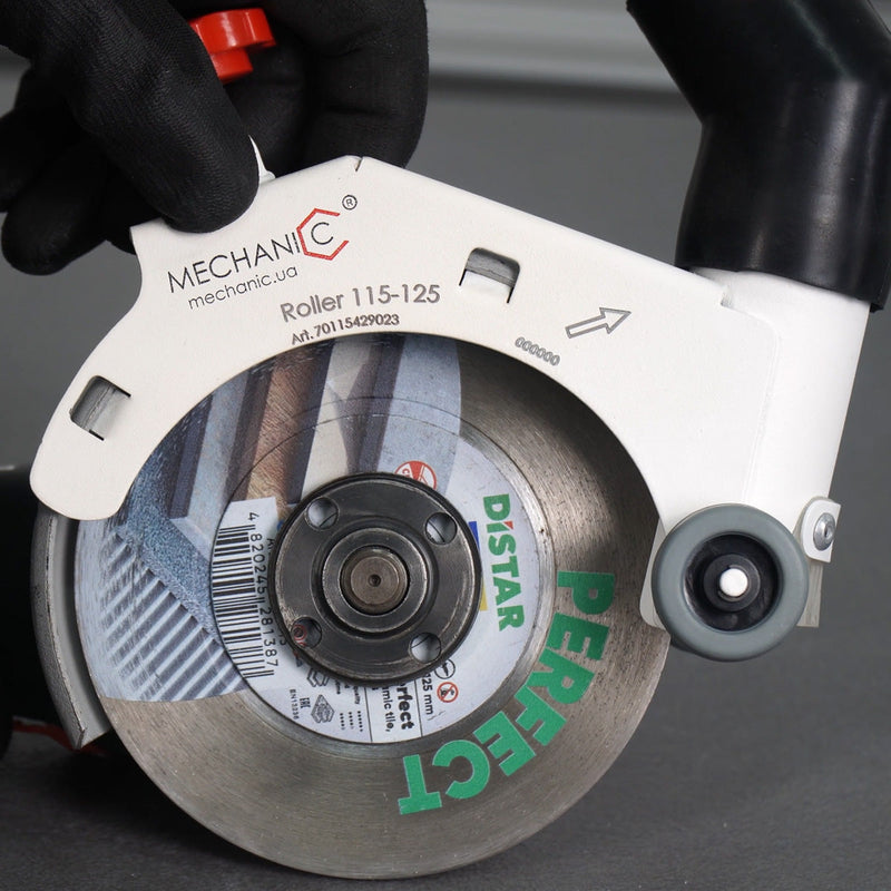 Professional tiler using ROLLER Cutting Guard for dust-free tile cutting
