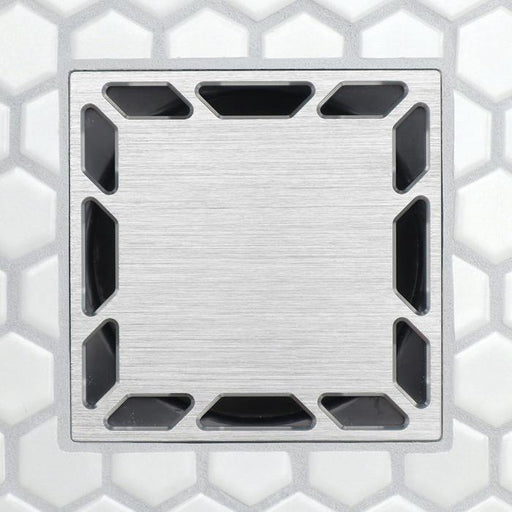 Brushed metal square drain grate with inset rectangular slots around the edges