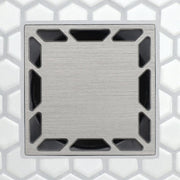 Brushed silver drain grate, square shape with corner slots and dark interior channels