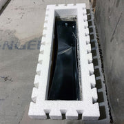 Built With Foam containment barrier with slots and holes