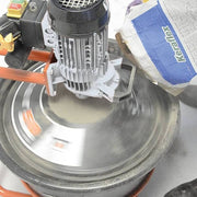 Universal mixer close-up: spinning drum and motor housing over the tub