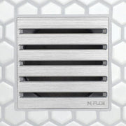 Brushed metal linear drain grate with five long horizontal slotted channels