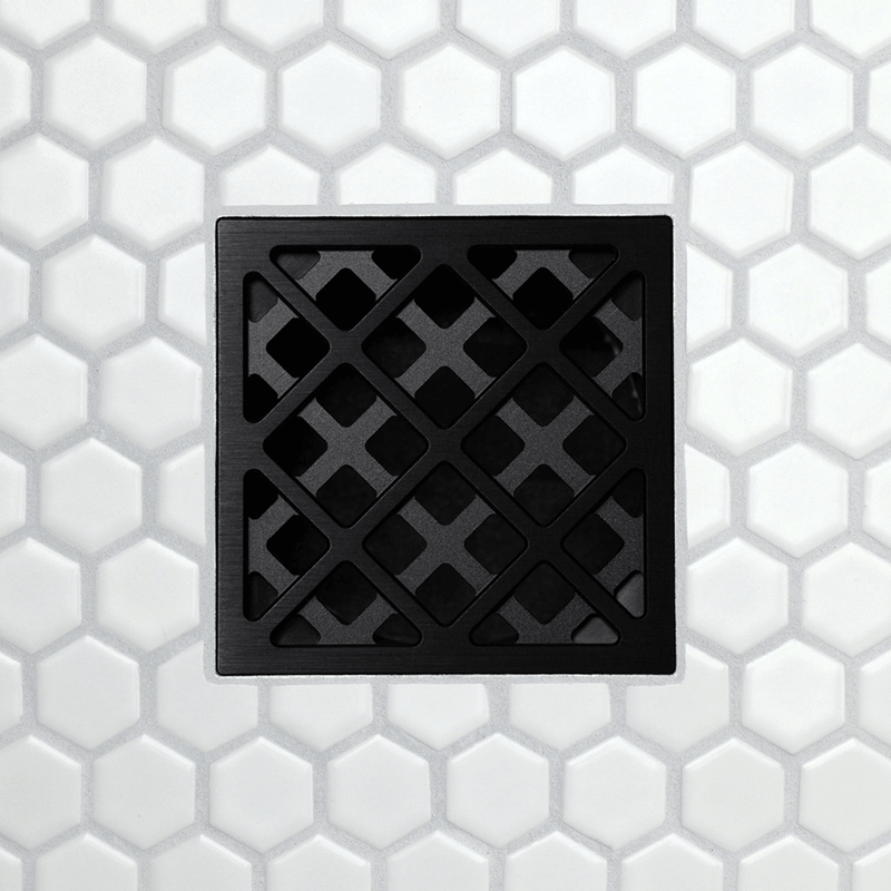 FloFX drain grate with chainlink pattern metal frame and square opening tiles, matte black finish