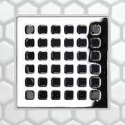 Square drain grate with shiny black face and grid of square-edged openings