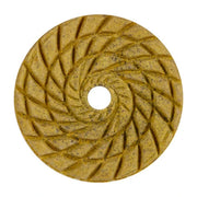 Round diamond grinding disc with a textured surface on a white background