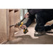 Contractor drilling into wall frame with DEWALT 60V MAX Mixer/Drill with E-CLUTCH® for safety