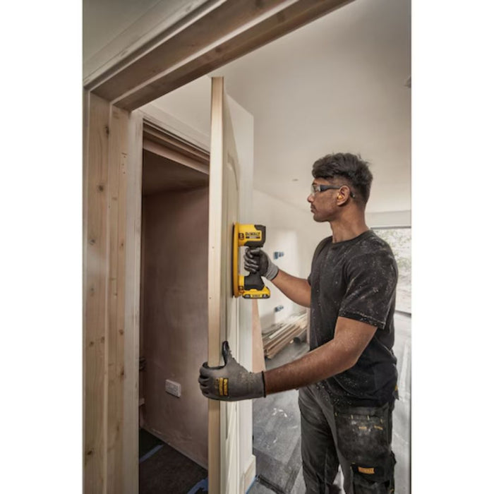 Dewalt 20V MAX GRABO Lifter in use – lifting a door for installation
