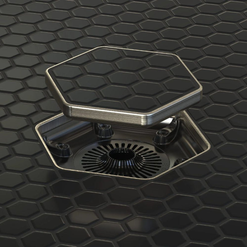 Tile-in hex drain with brushed nickel style rim and black central grate