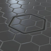 Tile-in hex drain opening with dark insert and brushed metal square frame