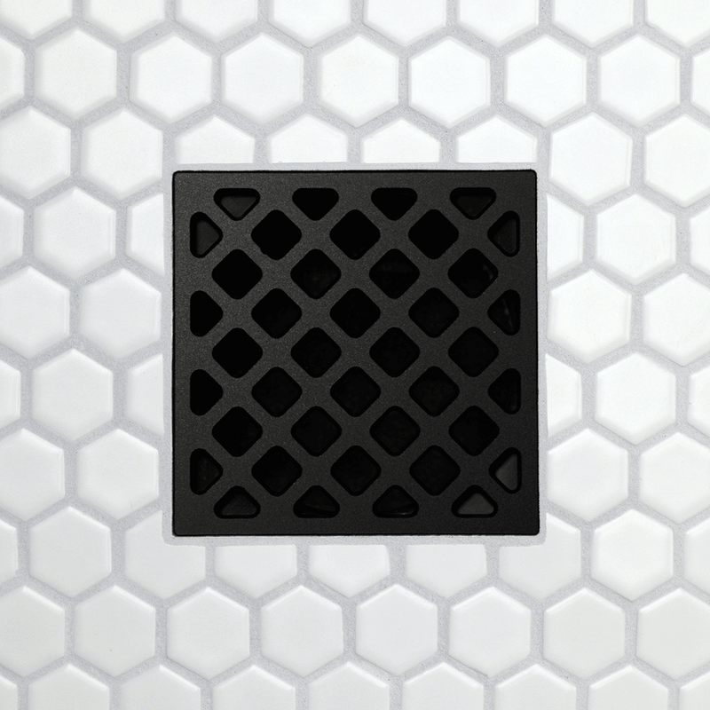 Drain grate with diamond-grid pattern, metal frame with rectangular channel slots, matte black finish