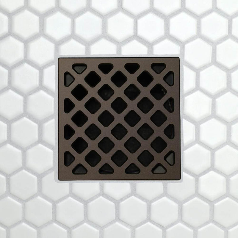 FloFX Drain Grate with X-pattern diamond cutouts, dark finish.