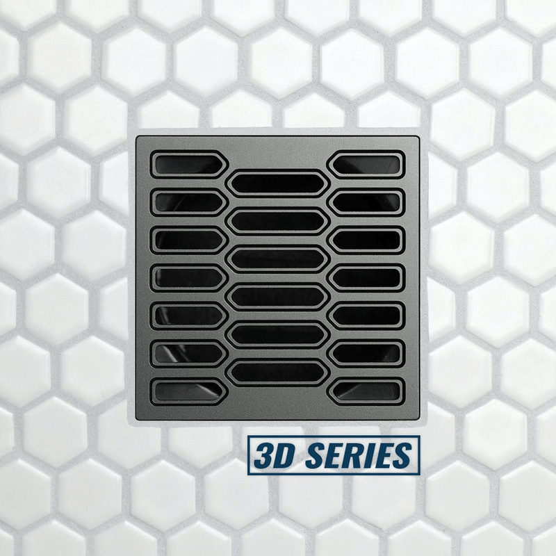 FloFX Hex 3D style drain grate with interlocking rounded-rectangle channels, graphite gray finish.