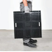 Transporting UP! tile pad with handle grip