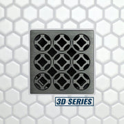 Drain grate with round, dimpled grid openings on brushed metal.
