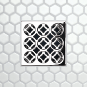Square drain grate with 3x3 circular openings, polished chrome frame