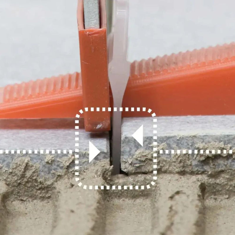 Raimondi wedge inserted between two uneven tiles to eliminate lippage and align surfaces