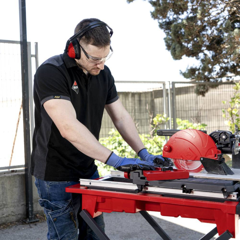 Contractor making precision cuts with the Rubi 7 inch tile saw