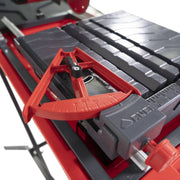 The Rubi DT-7IN features a combination rip guide/ angle guide