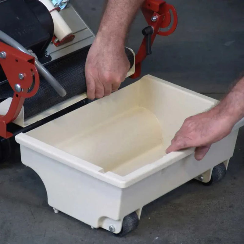 Close-up of the Berta sponge grout cleaning machine water basin access for quick water change.