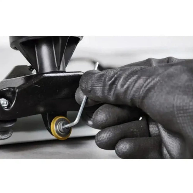 Close-up titanium scoring wheel with bearing being replaced on Raimondi Raizor MkII