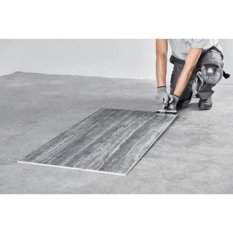 Tile cut line along modular rails with mounted cutting tool