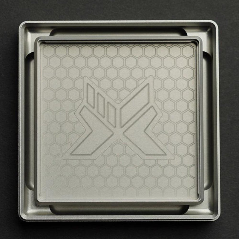 Tile In Grate insert with X motif, brushed metal frame