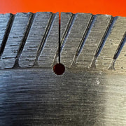 Close-up of chip-free tile cut with diamond blade