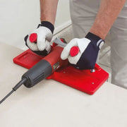 Contractor using the Montolit Toprofile to miter the edge of  stone.