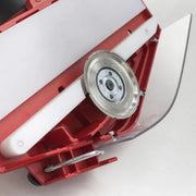 The underside of the Montolit Toprofile displaying the scratch resistent guide, guard, and profile wheel