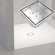 Tileable Square shower drain in a tiled bathroom setting