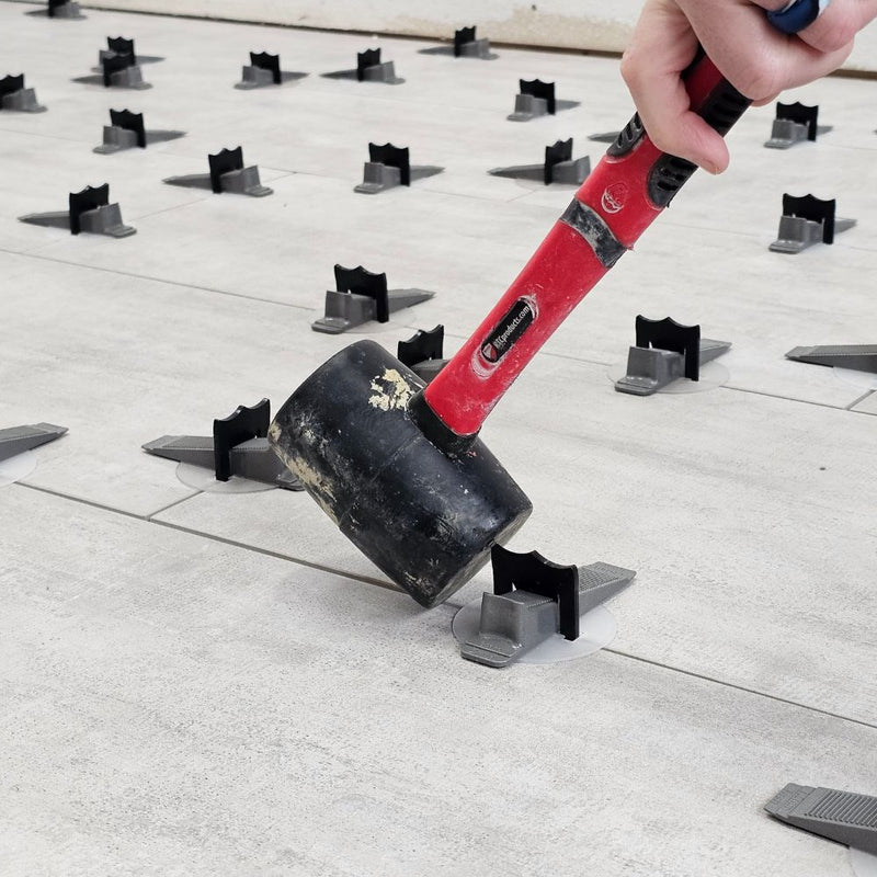 Wedge MD Tile Leveling System wedge can be removed with a mallet or a kick 