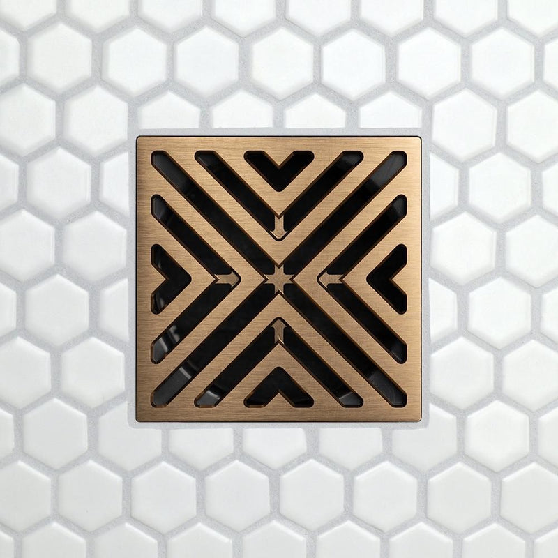 FloFX drain grate with X-Factor V-slot pattern, brushed bronze frame and black openings