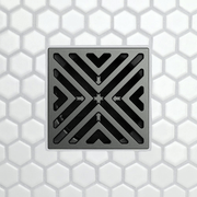 Drain grate with bold X-shaped arrow openings, black finish.