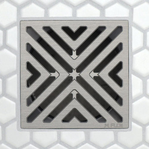 FloFX drain grate with chevron/V-shaped openings in brushed silver-tone finish