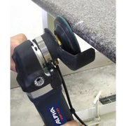 Worker using a Ceramica EX pad on a wet polisher to polish the edge of a bullnose